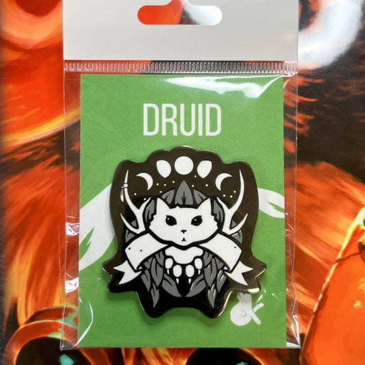Druid enamel pin featuring a black and white cat druid with antlers and black nickel plating.
