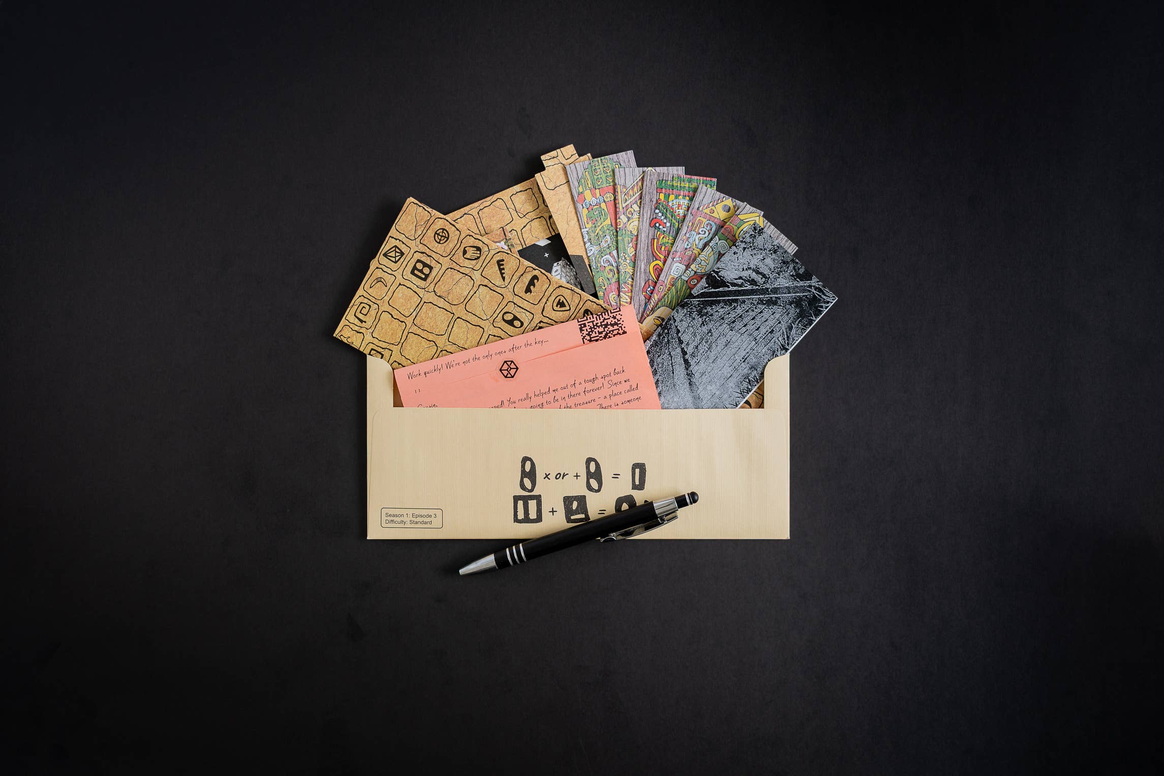 Family Secrets Series Episode 3: Ancient Mysteries set with cards, pen, and patterned papers.