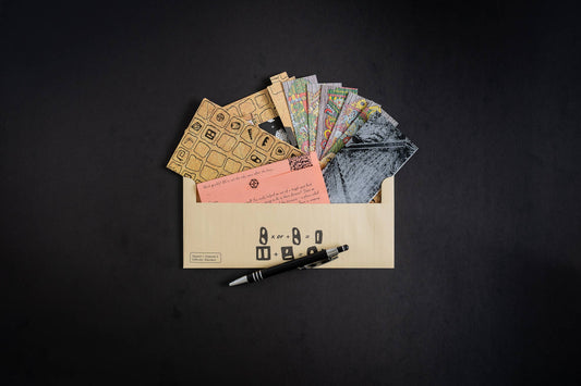 Family Secrets Series Episode 3: Ancient Mysteries set with cards, pen, and patterned papers.