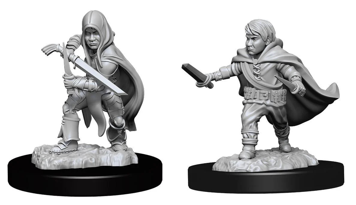 D&D miniatures: hooded archer and NMU Halfling Male Rogue W13, each on a round base.