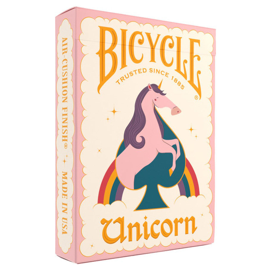 Bicycle Unicorn Pink playing cards with pink unicorn, rainbows, and pastel colors on the packaging.