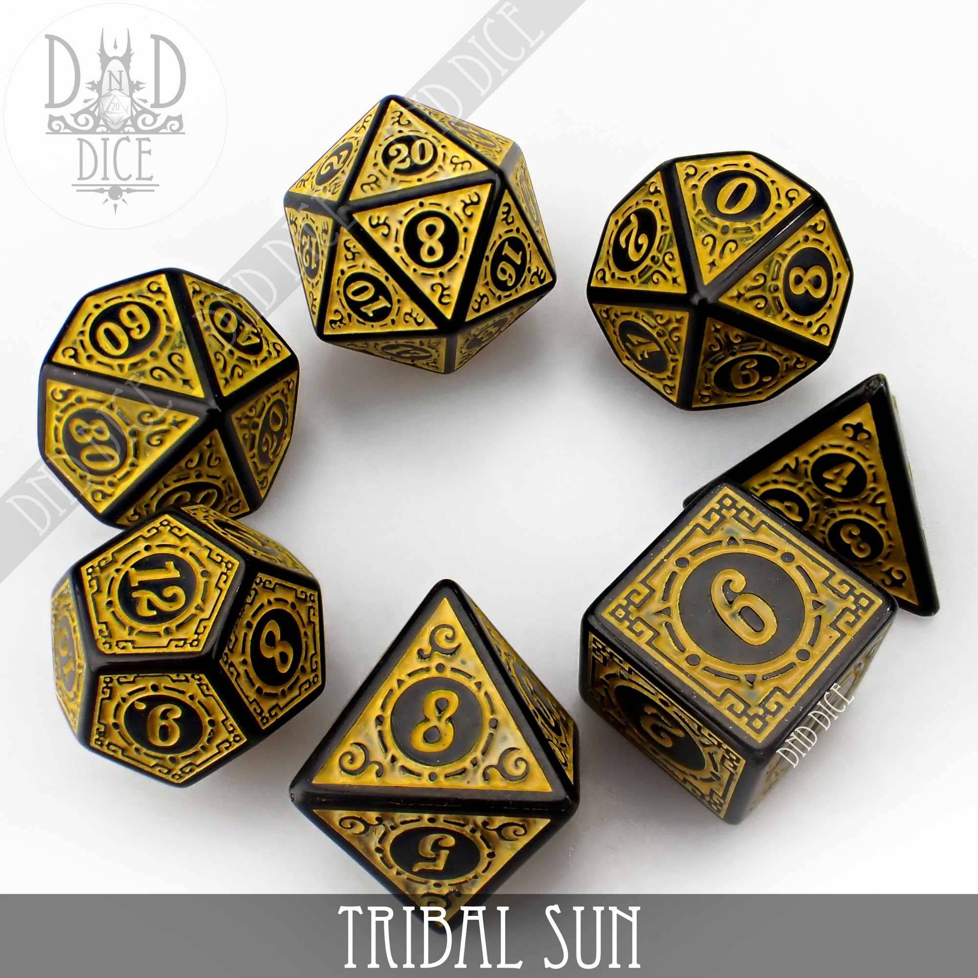 Set of seven black and gold RPG dice with ornate designs, Tribal Sun variant from DND Dice.