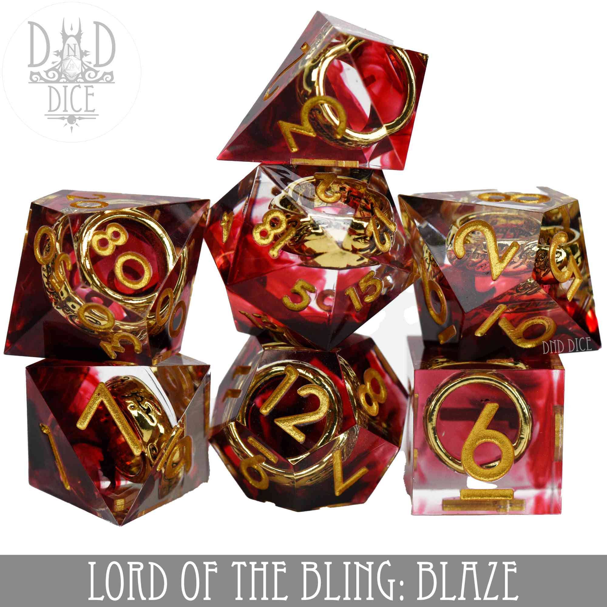 Lord of the Bling: Blaze variant red resin DND dice set with gold numbers and rings, stacked.