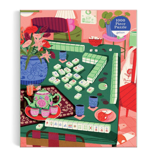 Mahjong Social 1000 Piece Puzzle by Paige Jung featuring a teapot, cups, flowers, and chairs on a patterned table.