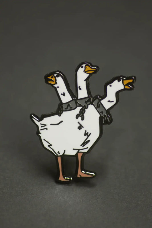 Three-headed white goose enamel pin from the Cute Pin Pack.