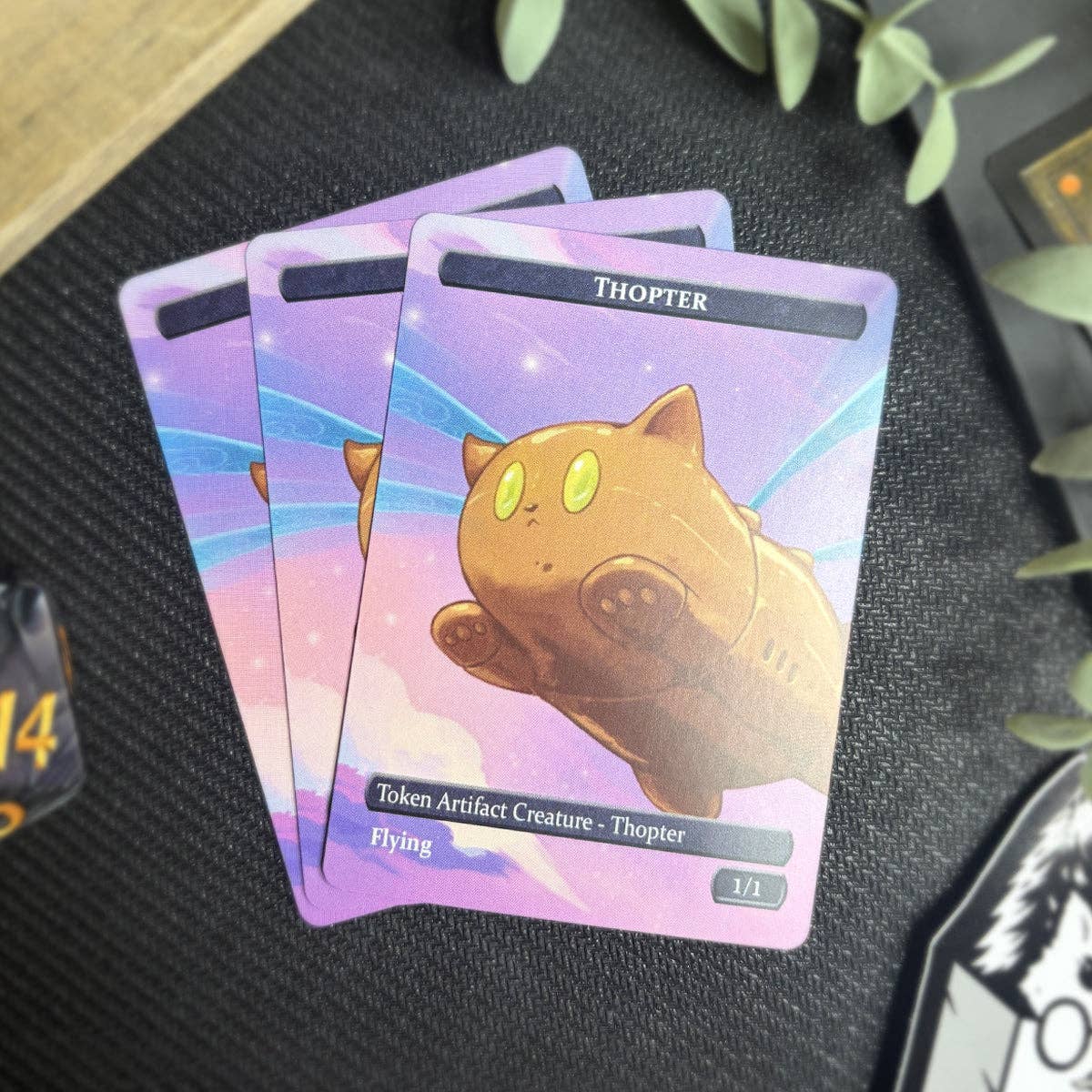 Three Thopter & Clue Token Set cards displayed on a surface.