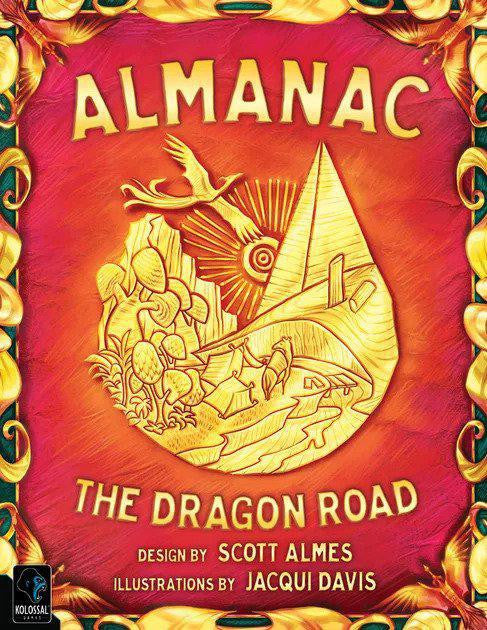 Almanac: The Dragon Road game with a red cover and gold embossed dragon, bird, and wagon designs.