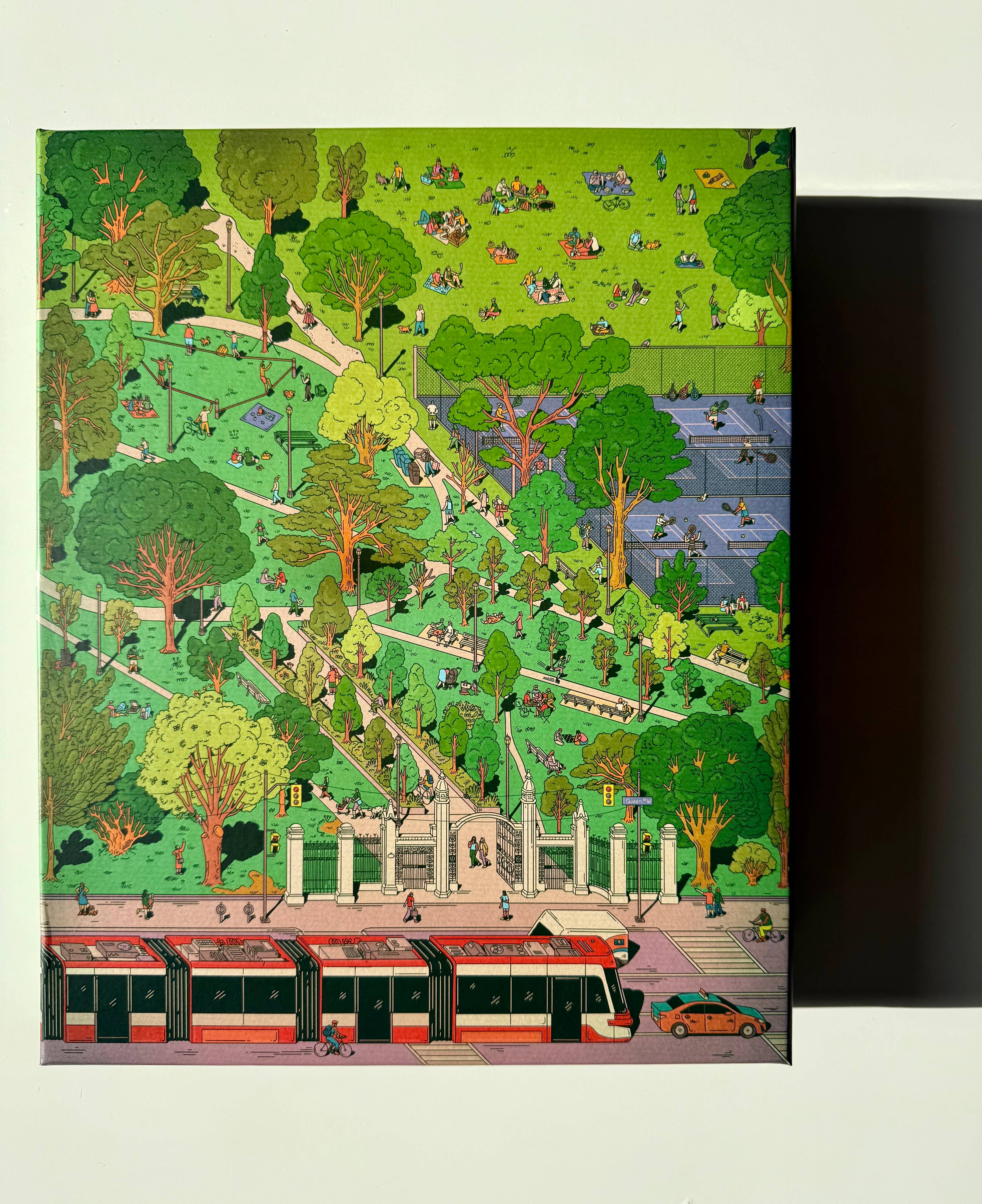 Trinity Bellwoods 1000-piece puzzle for adults with Kathleen Fu’s illustration of the Toronto park on a sunny day.