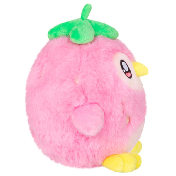Strawberry Penguin Alter Ego Squishable plush, round and pink with leafy top, yellow feet and beak, and large eyes.