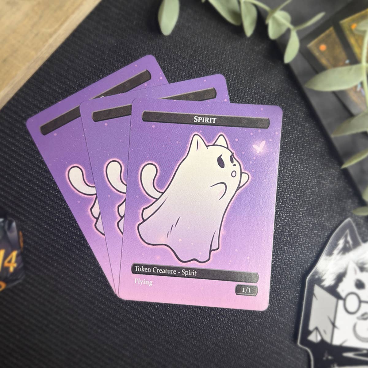Three purple Spirit & Cat Token Set cards featuring a ghost cat labeled Spirit with Flying and Token Creature.