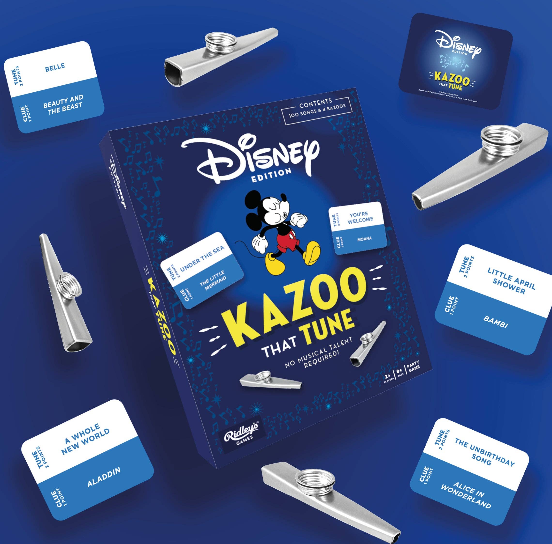 Disney Kazoo That Tune box with kazoos and Disney song cards displayed on a blue surface.