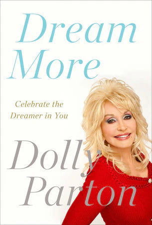 Dream More book cover with Dolly Parton in red and subtitle Celebrate the Dreamer in You.