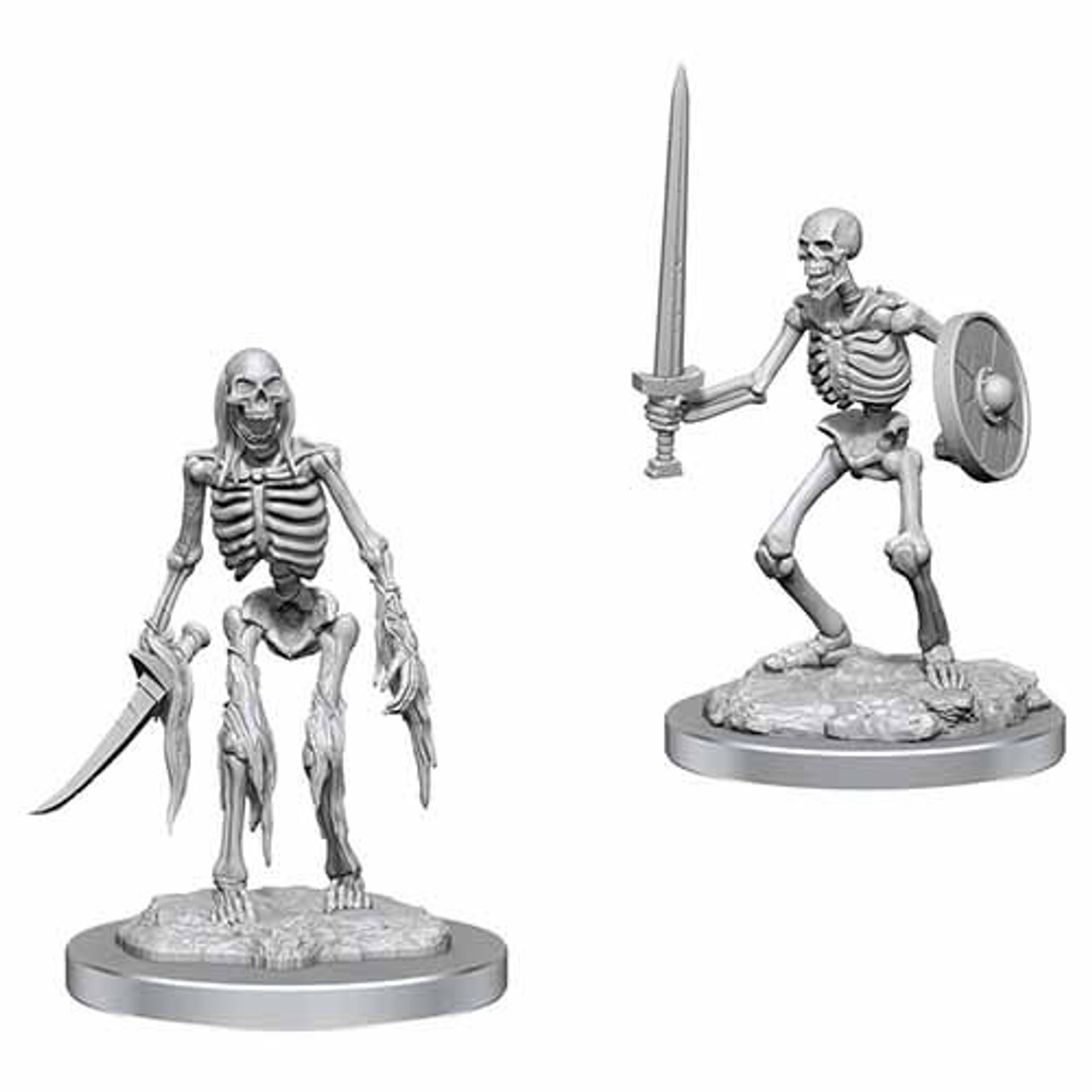 D&D Miniatures Skeletons set: two unpainted figures, one dual-wielding, one with sword and shield, on round bases.