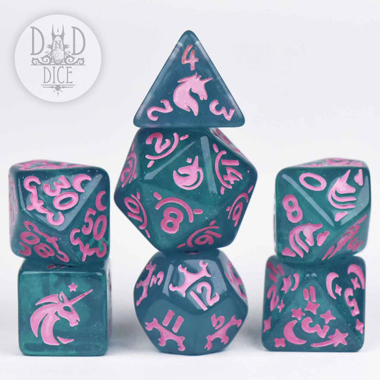 Unicorn Princess teal resin 7-dice set with pink unicorn and fantasy icons for tabletop games.