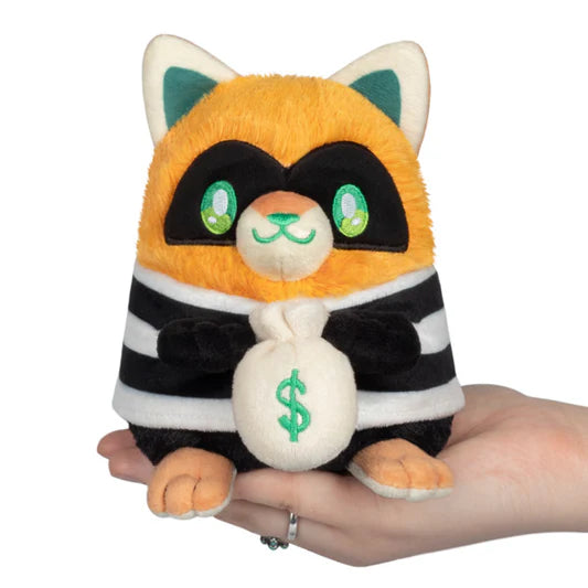 Alter Ego Kitty - Cat Burglar plush toy: raccoon cat in bandit outfit holding a money bag.