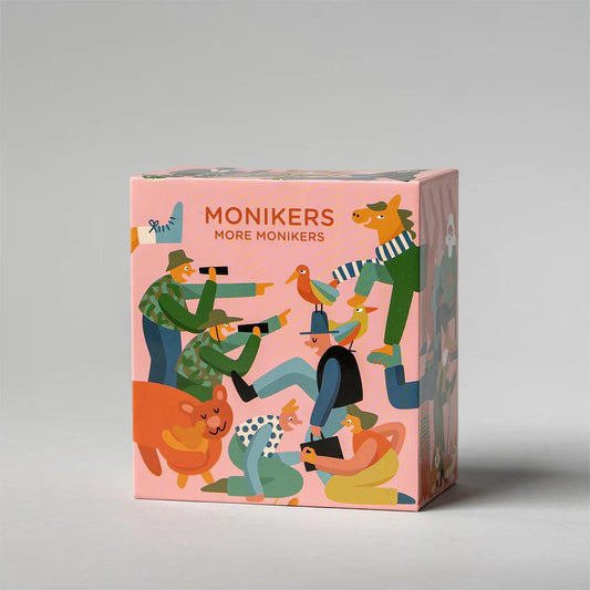 Pink box labeled More Monikers, a party game expansion featuring illustrations of people and animals.