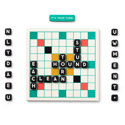 Scrumble Magnetic Fridge Game with letter tiles forming EACH, CLEAN, TURN, HOUND, STUR and extra tiles shown.