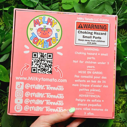 Kimono Kitties 500-piece puzzle in pink Milky Tomato box with warnings and QR code visible.