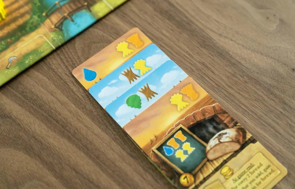 Beer & Bread 2-player card game featuring cards with colored tokens and resource management symbols.