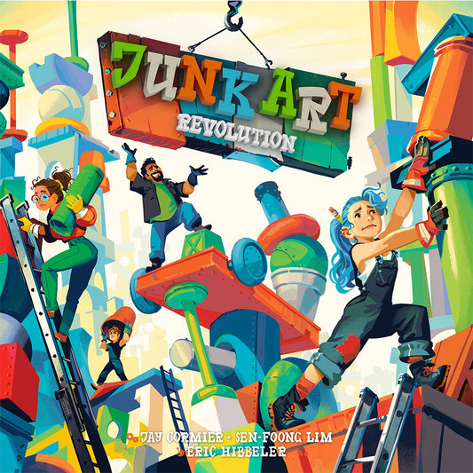 Four people play Junk Art Revolution, stacking colorful game pieces into sculptures.