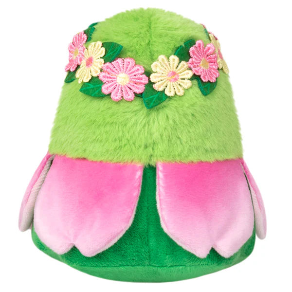 The Alter Ego Plague Doctor - Nymph is a green plush with pink petals and a floral crown.