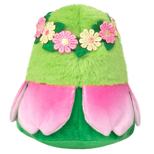The Alter Ego Plague Doctor - Nymph is a green plush with pink petals and a floral crown.
