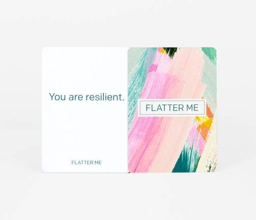 Flatter Me card game featuring the text You are resilient with abstract colorful art on the cards.