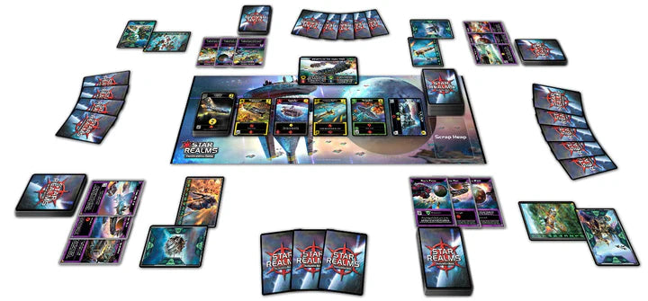 Star Realms Box Set with decks and cards set up on a central playmat for multiplayer gameplay.