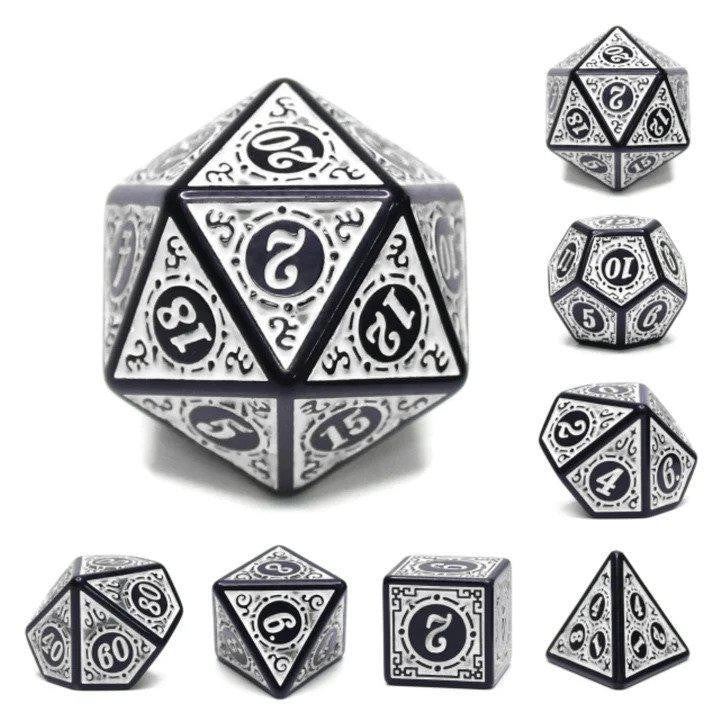 Magic Flame - White RPG Dice Set of black and white ornate resin dice on a white background.