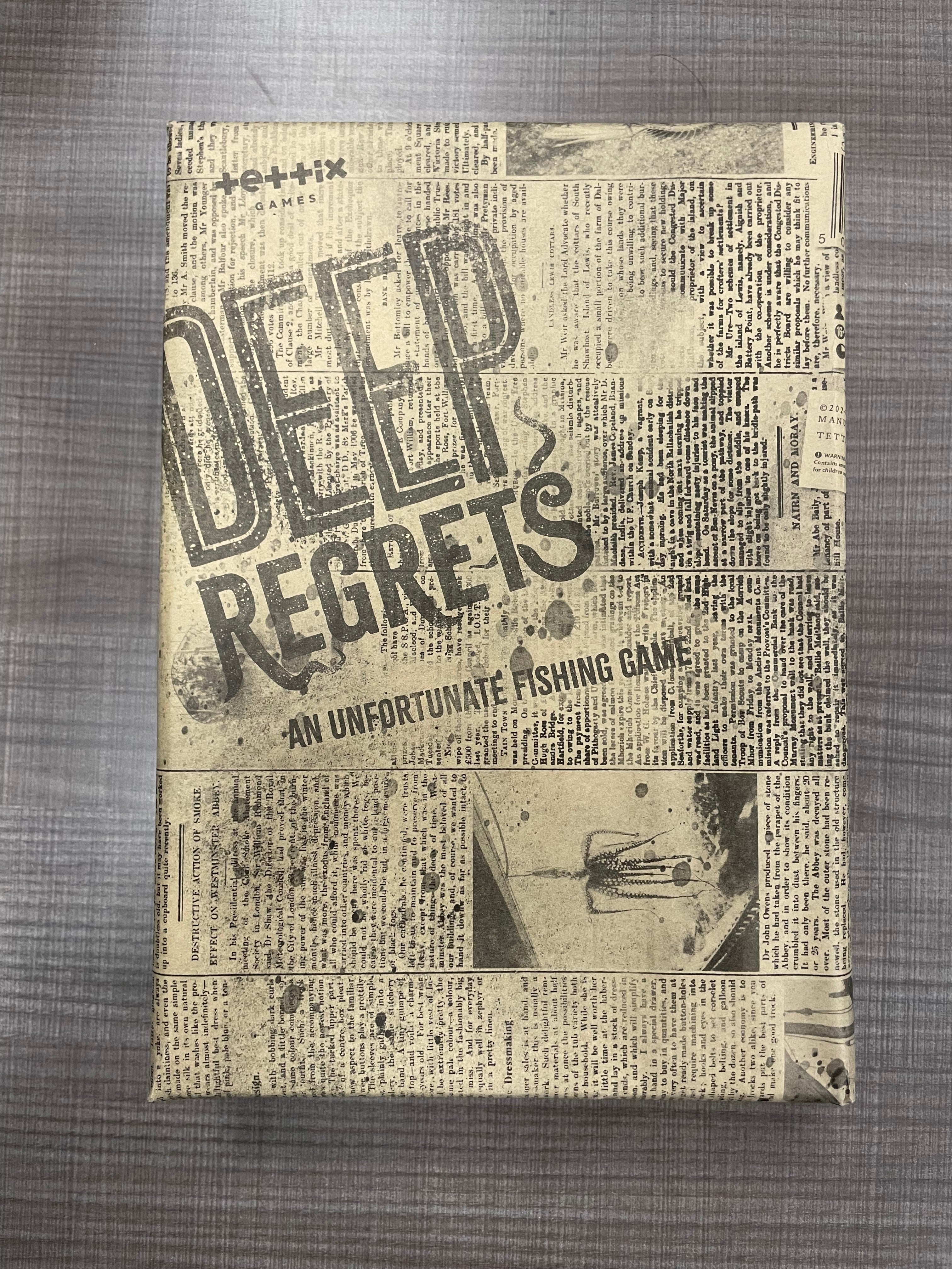 Deep Regrets KICKSTARTER EDITION game box with horror fishing and vintage newspaper design.