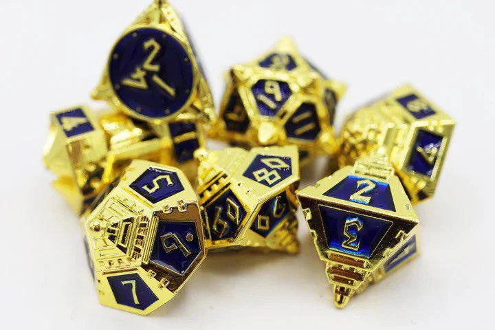 Foam Brain Dice 51: Cobalt Cosmos RPG metal dice set in gold and blue.