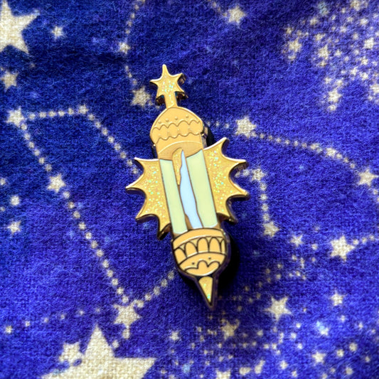 D&D Class Curiosities Pin with gold and glitter details.