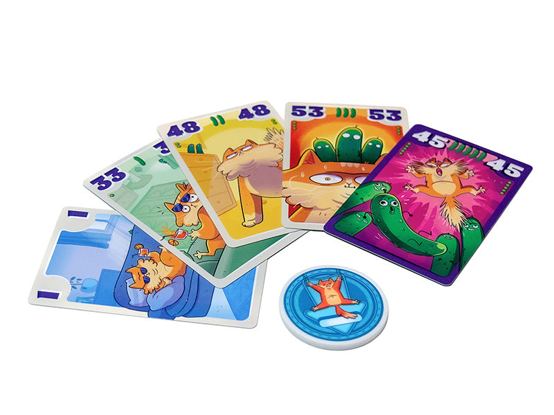 Cucumber CATastrophe board game with five animal-themed cards and a token.