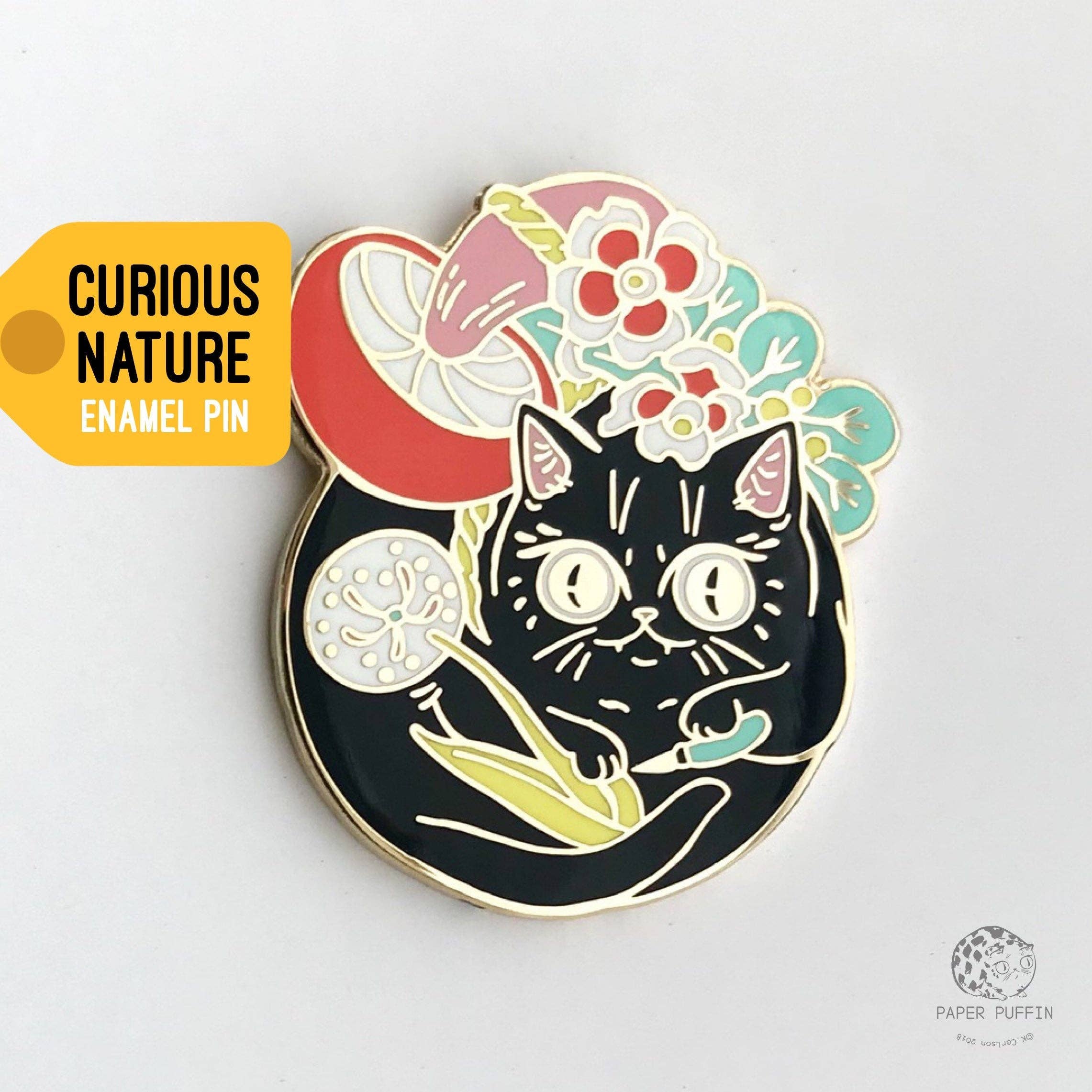 Curious Nature Cat enamel pin featuring a black cat, dandelion, mushrooms, and flowers.