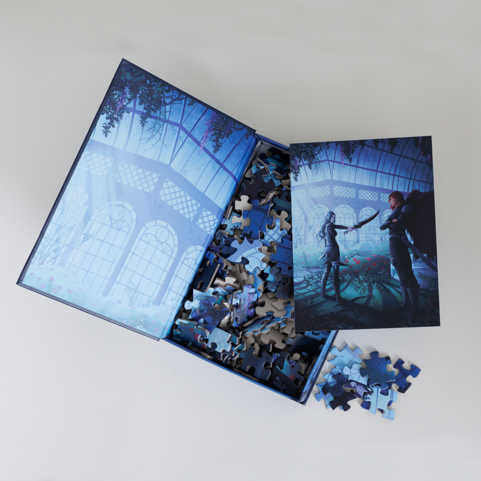 The Moonlit Reckoning Keepsake Puzzle | Crowns of Nyaxia edition with two figures in a glasshouse on the puzzle design.