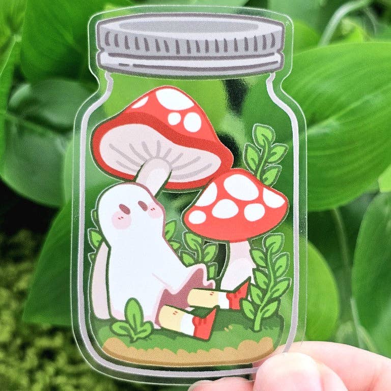 Red Mushroom Ghost In A Jar Transparent Sticker showing a ghost with red mushrooms and green plants.
