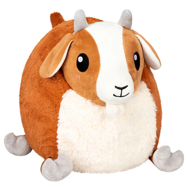 Baby Goat Squishable Plushie with round shape, brown and white fur, gray horns, floppy ears, and black eyes.