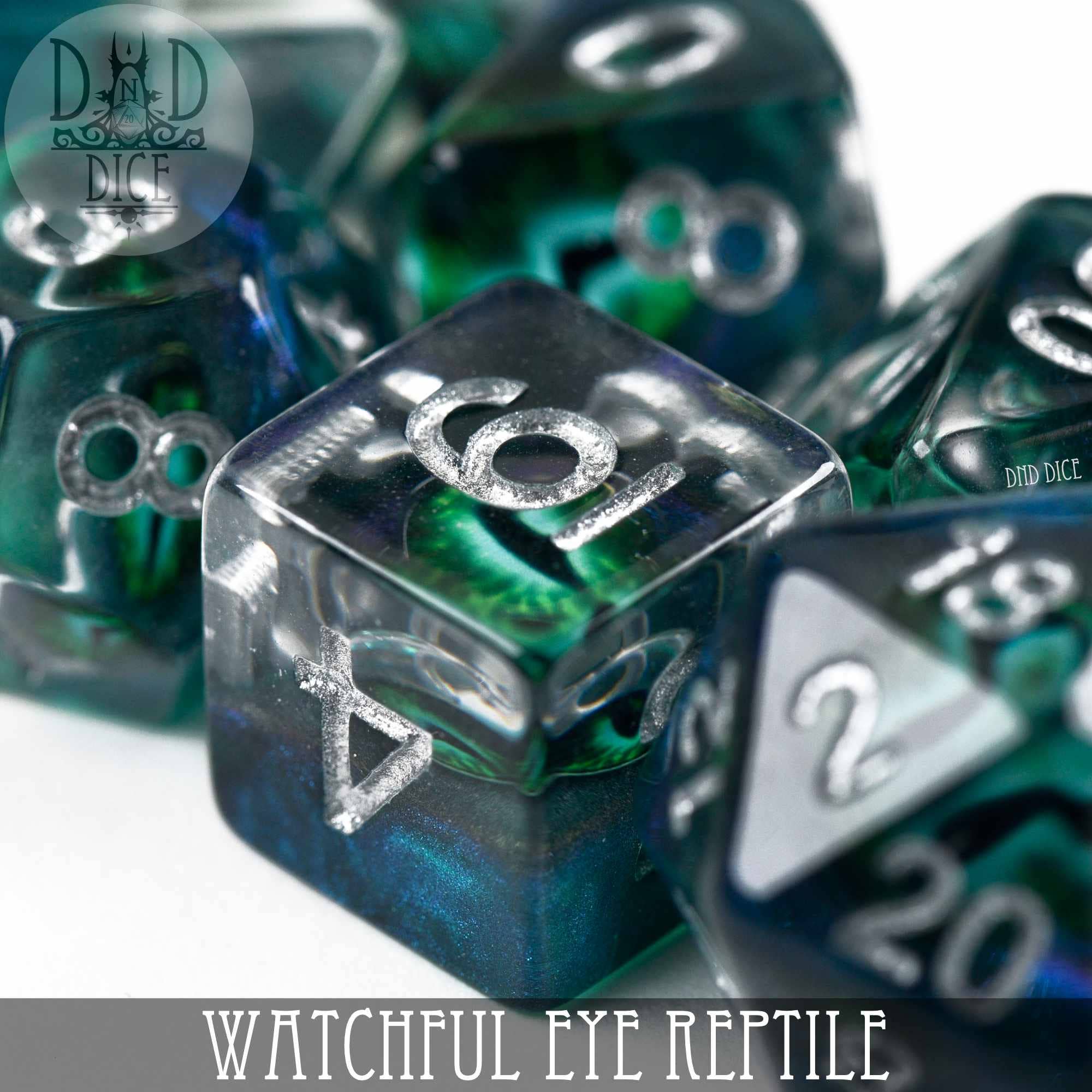 Green and blue resin dice with silver numbers, Watchful Eye - Reptile variant.