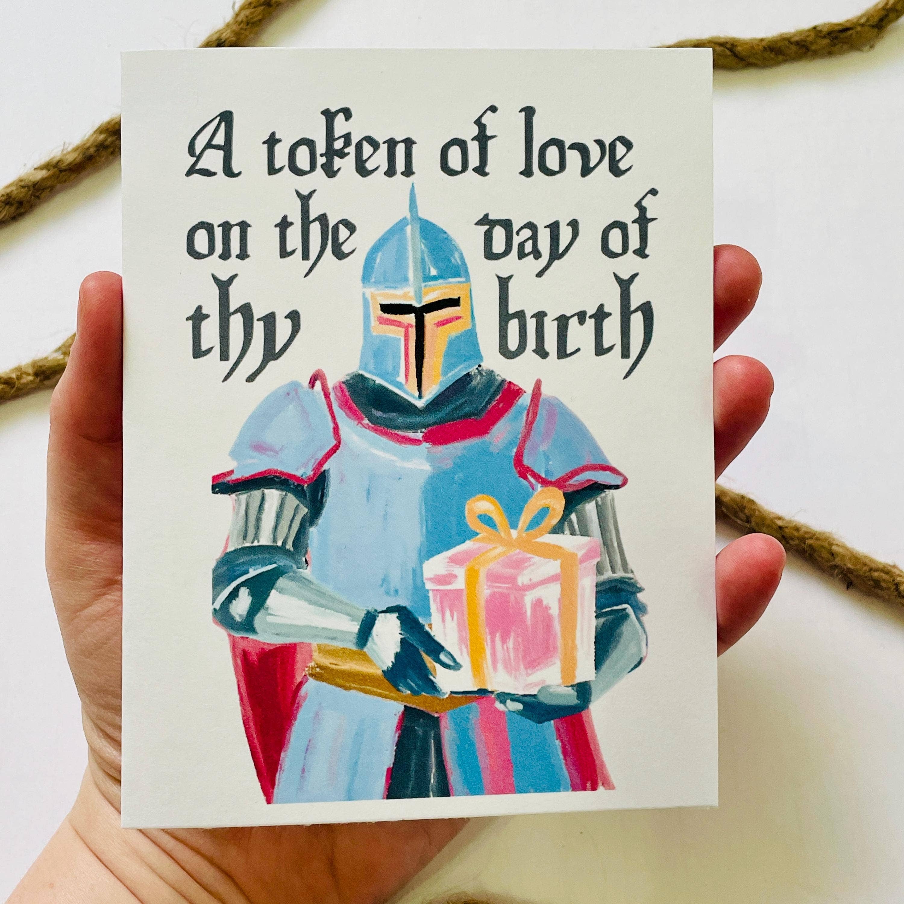 Medieval & Renaissance Role-Playing Birthday Card with knight in armor and birthday token held in a hand.
