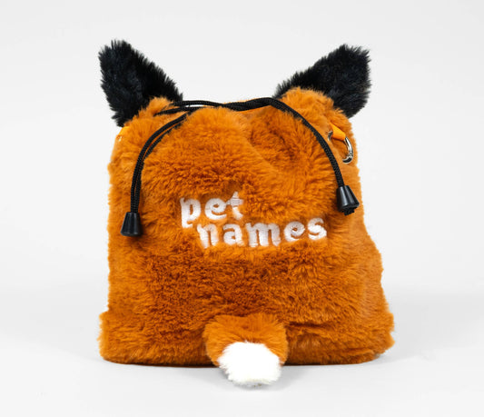 Fuzzy orange fox plush bag embroidered with pet names.