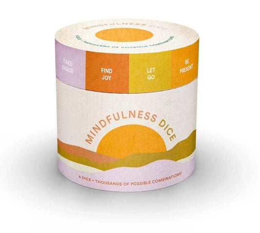 Mindfulness Dice in a cylindrical box with colored sections labeled Take Space, Find Joy, Let Go, Be Present.