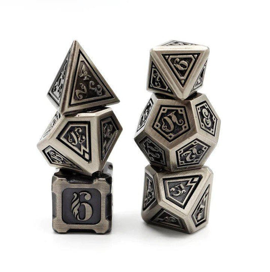 Two Alchemist Metals Iron RPG dice sets: d20, d12, d8, d6, and d4 dice on a white background.
