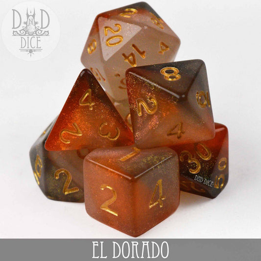 El Dorado set of glittery orange and gold acrylic DND dice with gold numbers.