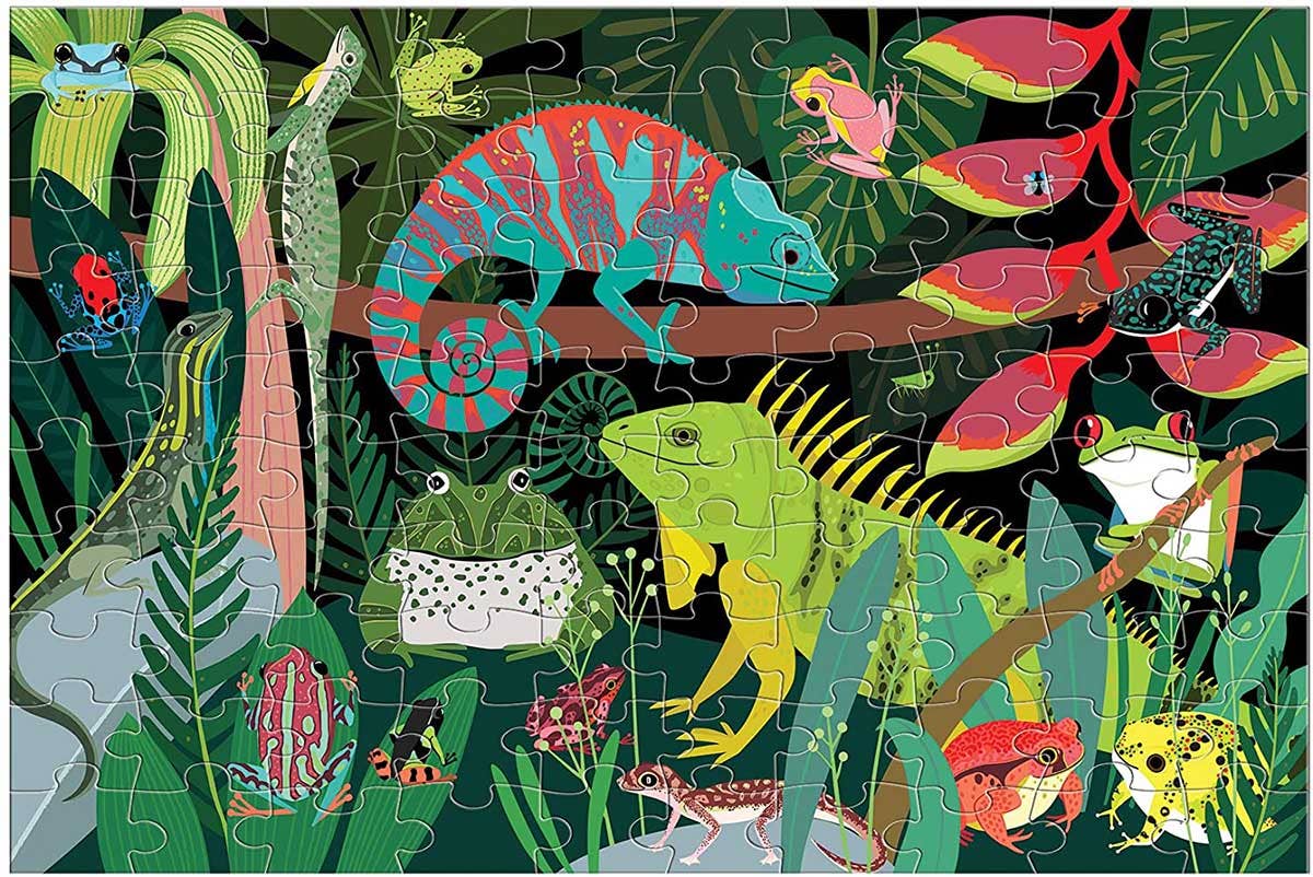 Frogs & Lizards Glow in the Dark Puzzle, 100 pieces, featuring chameleons and frogs in a jungle scene.