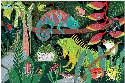 Frogs & Lizards Glow in the Dark Puzzle, 100 pieces, featuring chameleons and frogs in a jungle scene.