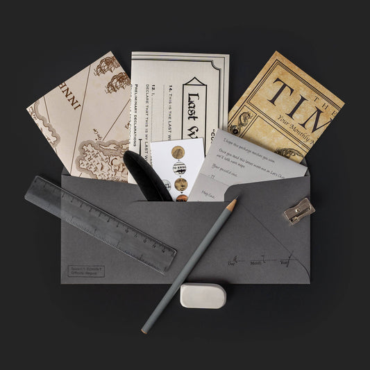 Family Secrets Series: Episode 6 - Quiet As The Grave mystery adventure in gray envelope packaging.