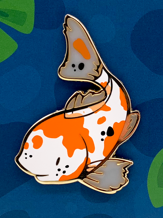 Ohkoiiiiii Fish Enamel Pin featuring a cartoon orange and white koi.