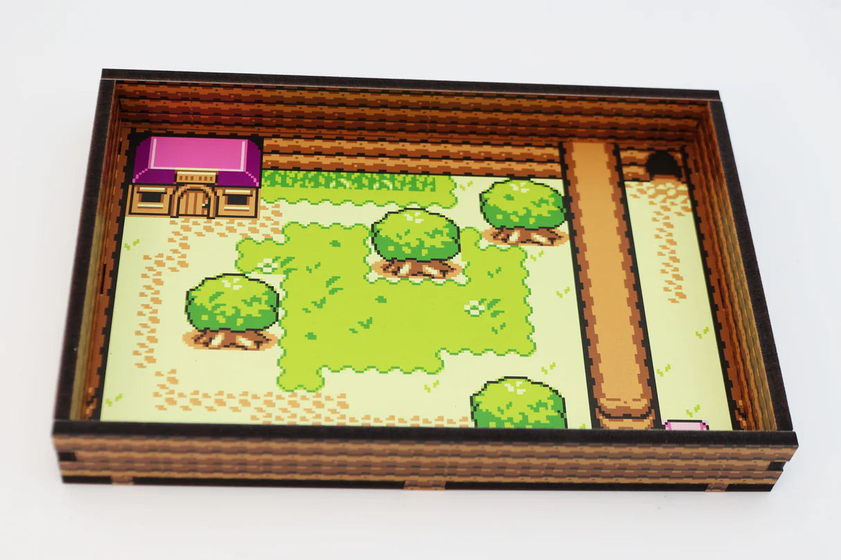 Chromatic Dice Tray - Pixel RPG variant with pixel art house, trees, and path design.