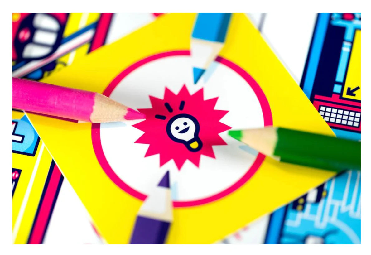 Three colored pencils point at a smiling lightbulb drawing related to the game Next Station London.