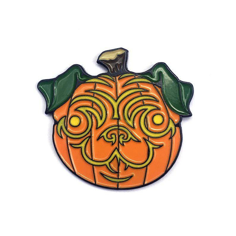 Kolorspun Pumpkin Pug Halloween enamel pin featuring an orange pumpkin with green leaves and a swirled pug face.
